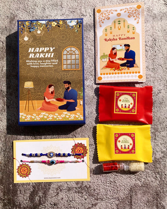 Bhai and Bhabhi Evil Eye Rakhi  | Magnetic Gift Box, Chocolate, Card, Roli & Chawal